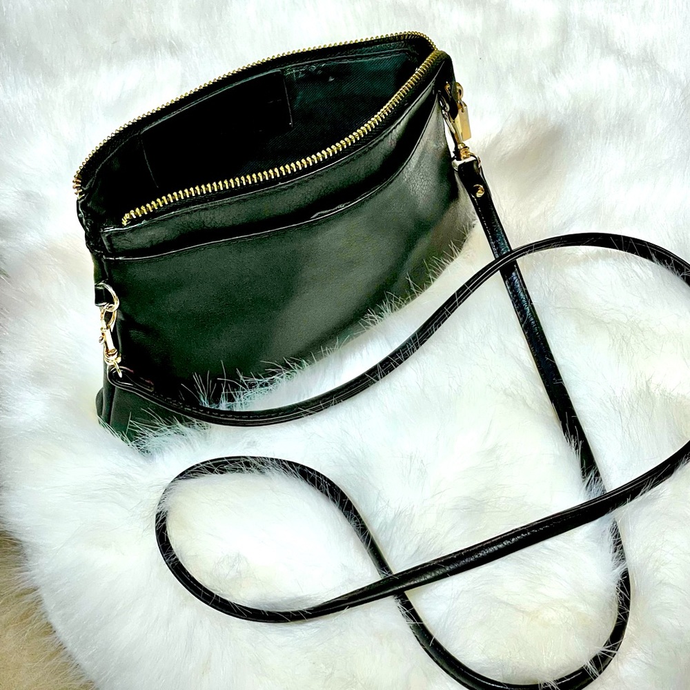 A. Bellucci Italian leather, small, black crossbody bag with gold hardware.